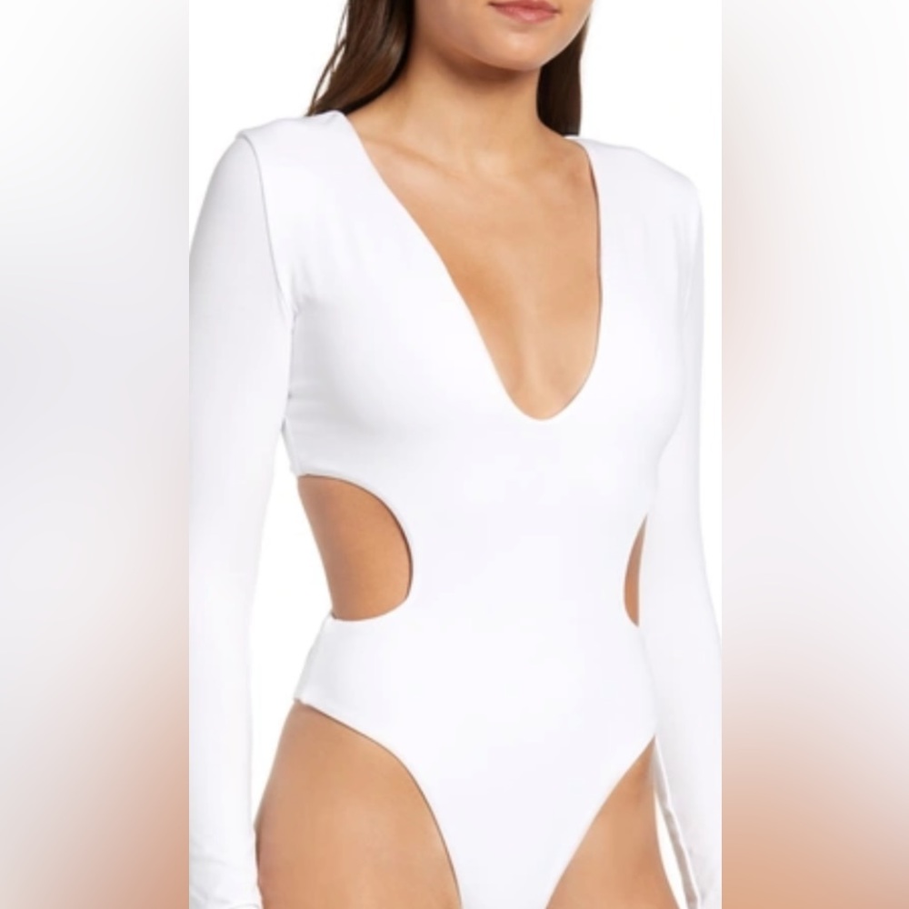 Tiger Mist white cut out body suit in medium NWT